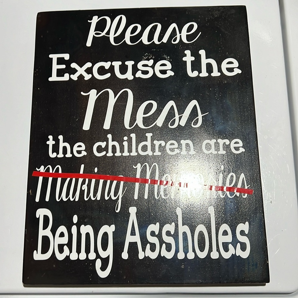 Wooden sign. Was custom made  with vinyl lettering